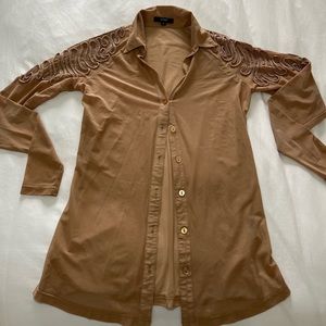 Beige see through button down long sleeve shirt.